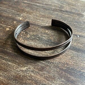 Bronze cuff bracelet.